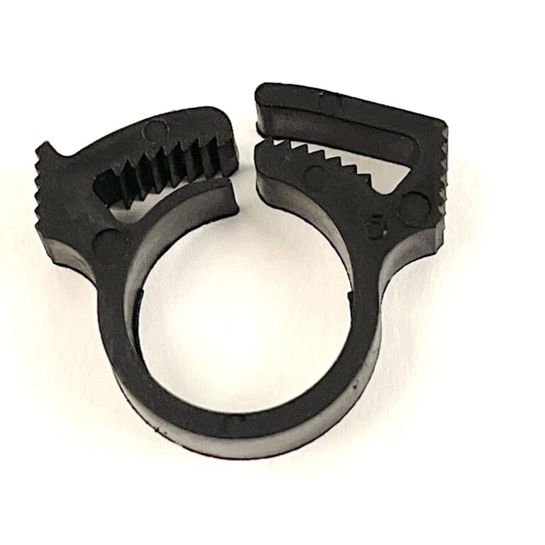 Klämma/clips drevoljeslang.